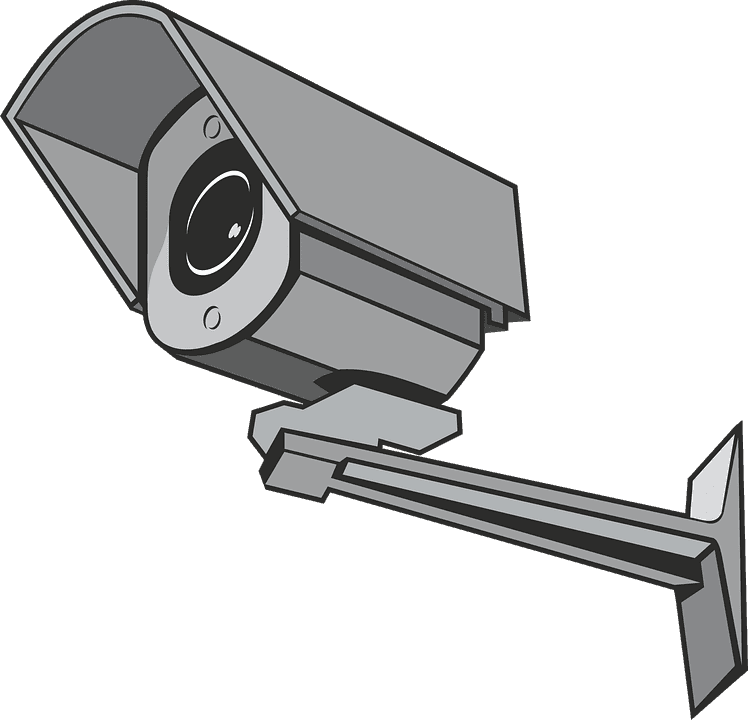 A surveillance camera attached to a wall